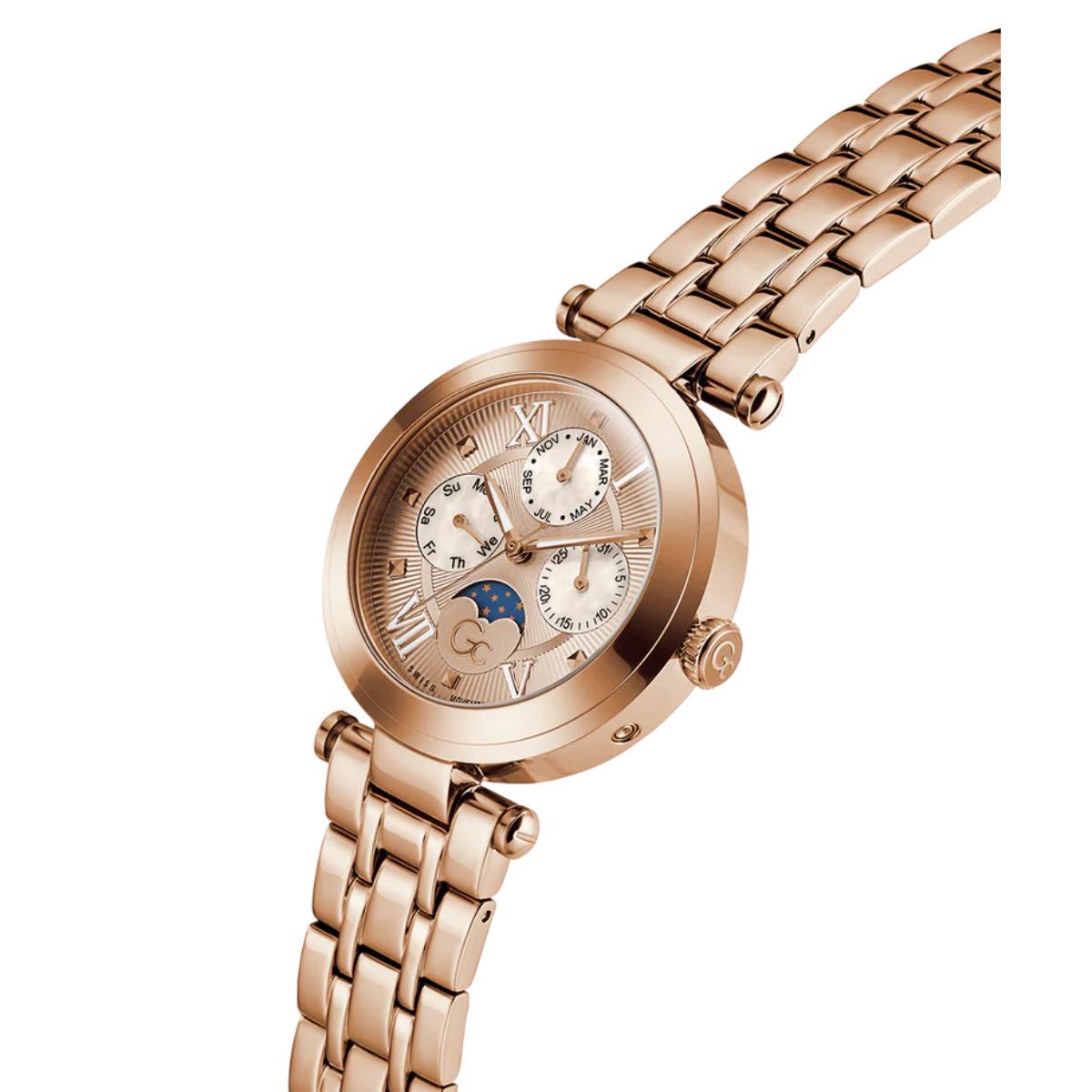 Rose gold watch with a detailed face on a white background