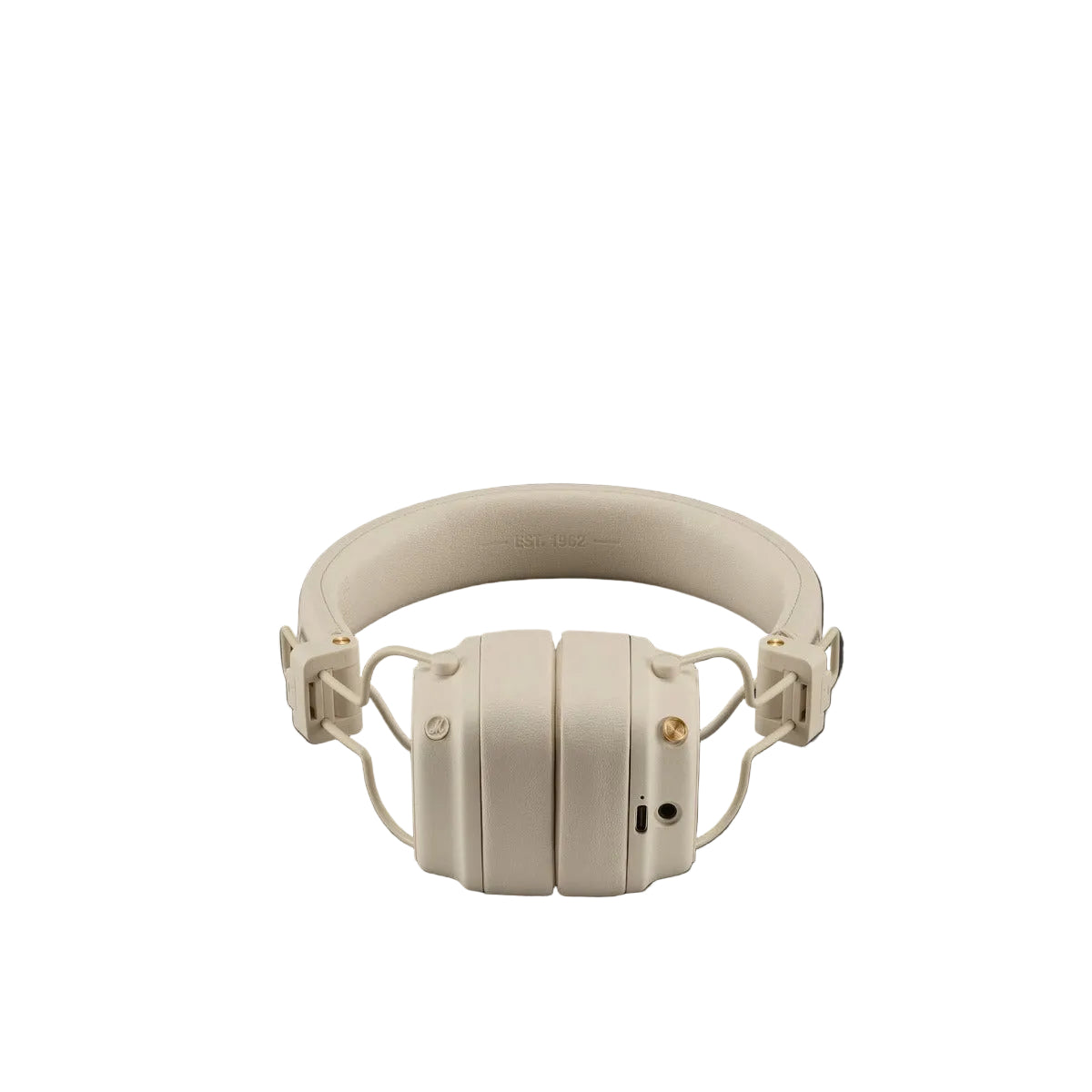 Beige headphones on a dark gray background