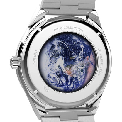 Silver watch with a detailed Earth illustration on the back, brand 'Q Collection' visible