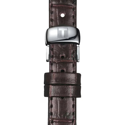 Brown leather watch strap with silver buckle on a white background