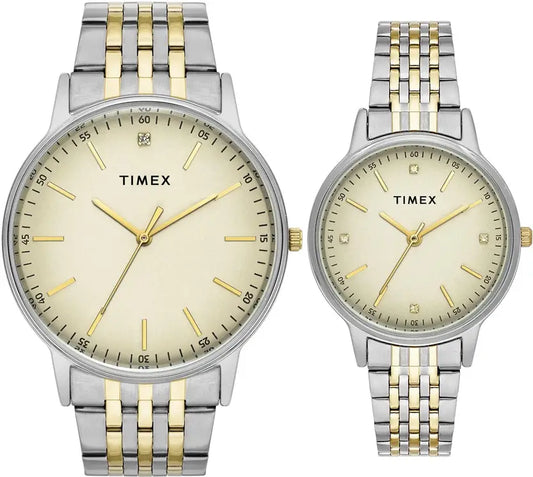 Two Timex watches with silver and gold two-tone bands on a white background